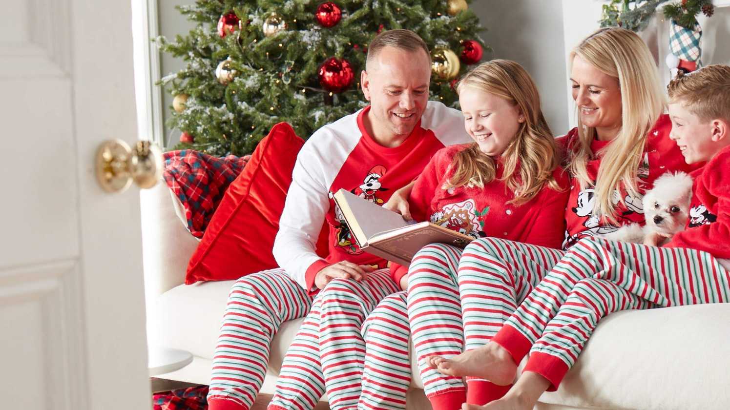 Make-A-Wish UK wish child Isla and her family modelling Disney’s festive collection in support of Make-A-Wish.