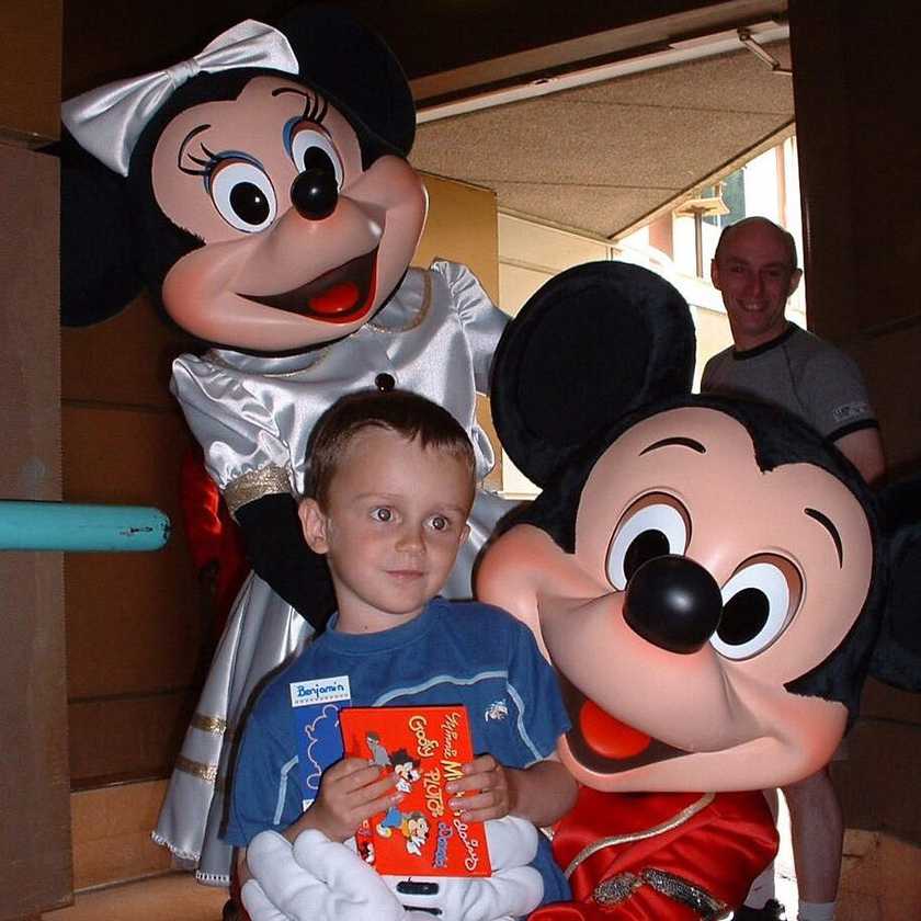Ben with Mickey and Minnie, during his wish