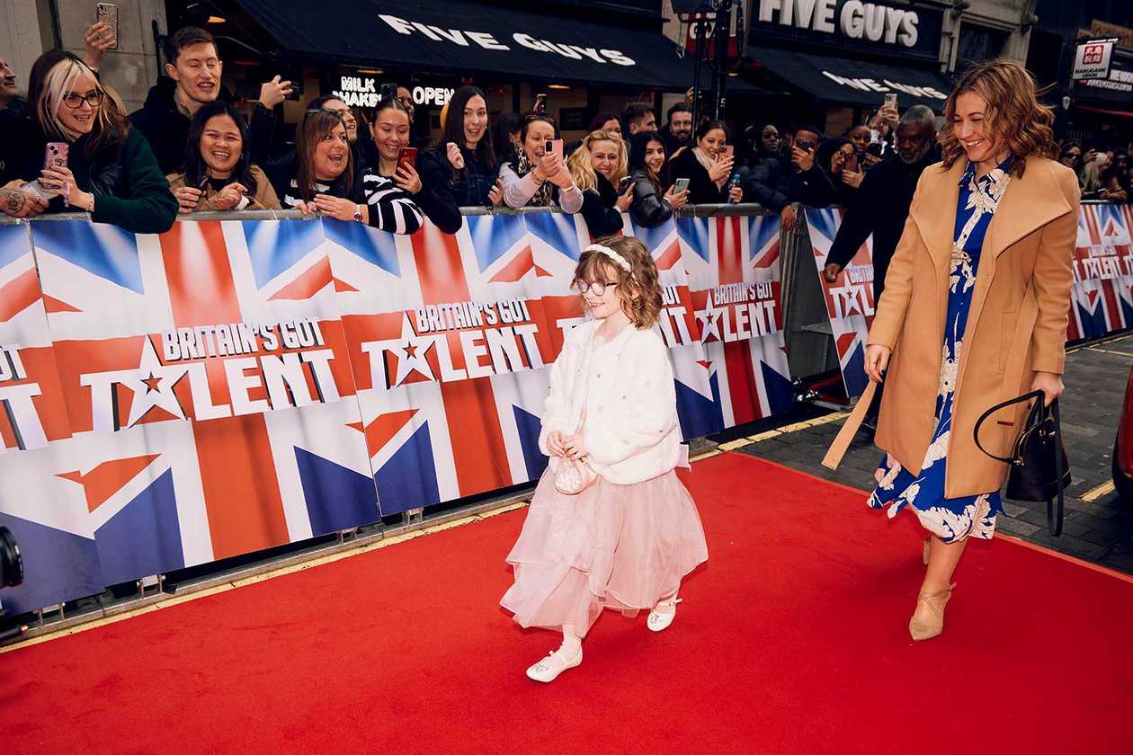 Wish child, Dulcie walking down the red carpet with her mum to watch Britain's Got Talent being recorded.