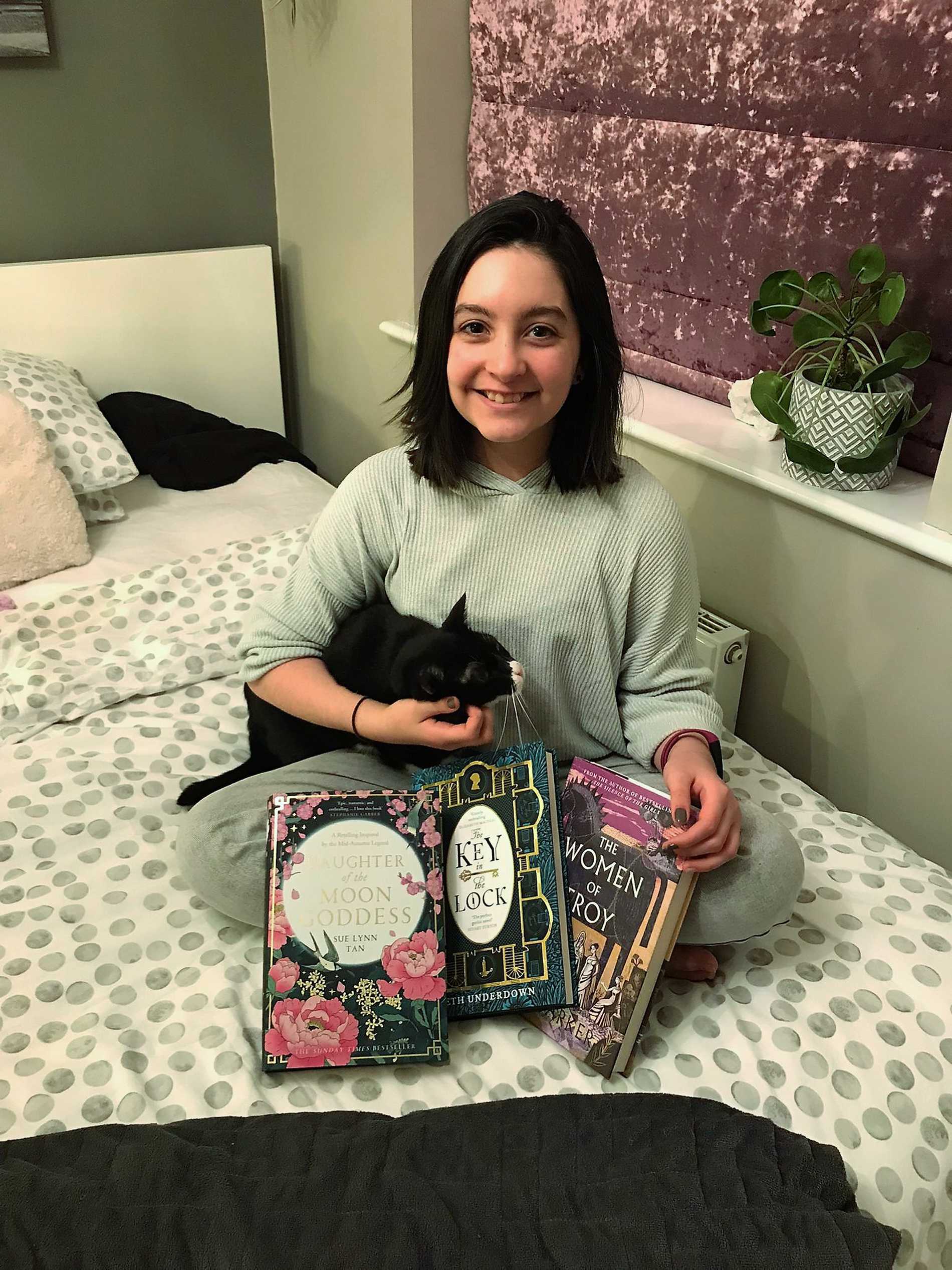 abi-with-books-image-g.jpeg