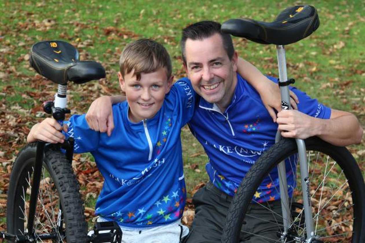 Two of our #WishHeroes with the unicycles they used during their fundraising challenge.