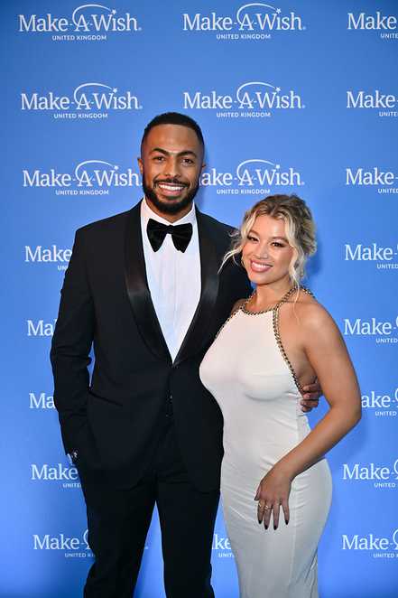 Tyler West and Molly Rainford pose at A Night of Wishes