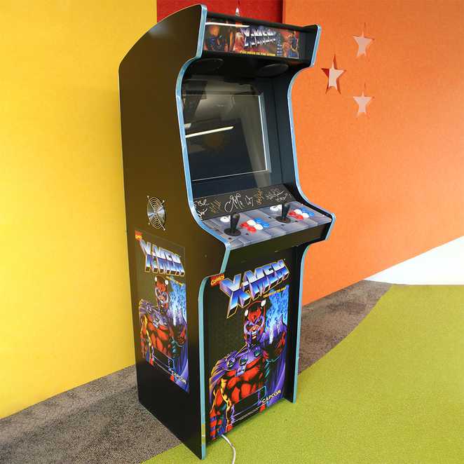An X-men: Children of the Atom arcade machine, signed by the cast of cast members of X-Men: Dark Phoenix.